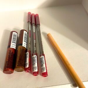 NYX PROFESSIONAL MAKEUP: EYELINER, BROW PENCIL & BUTTER GLOSS BLING.